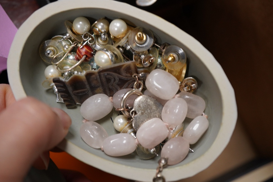 A cultured pearl necklace, composed of graduated cultured pearls of pale pink tint measuring approximately 11-12mm, to a spherical clasp stamped 14K; a black opal measuring approximatley 11 x 7mm, on a display cushion; a
